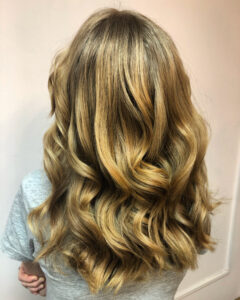 blonde with curls from behind