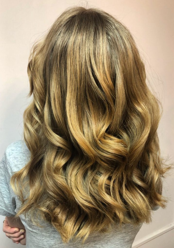 blonde with curls from behind